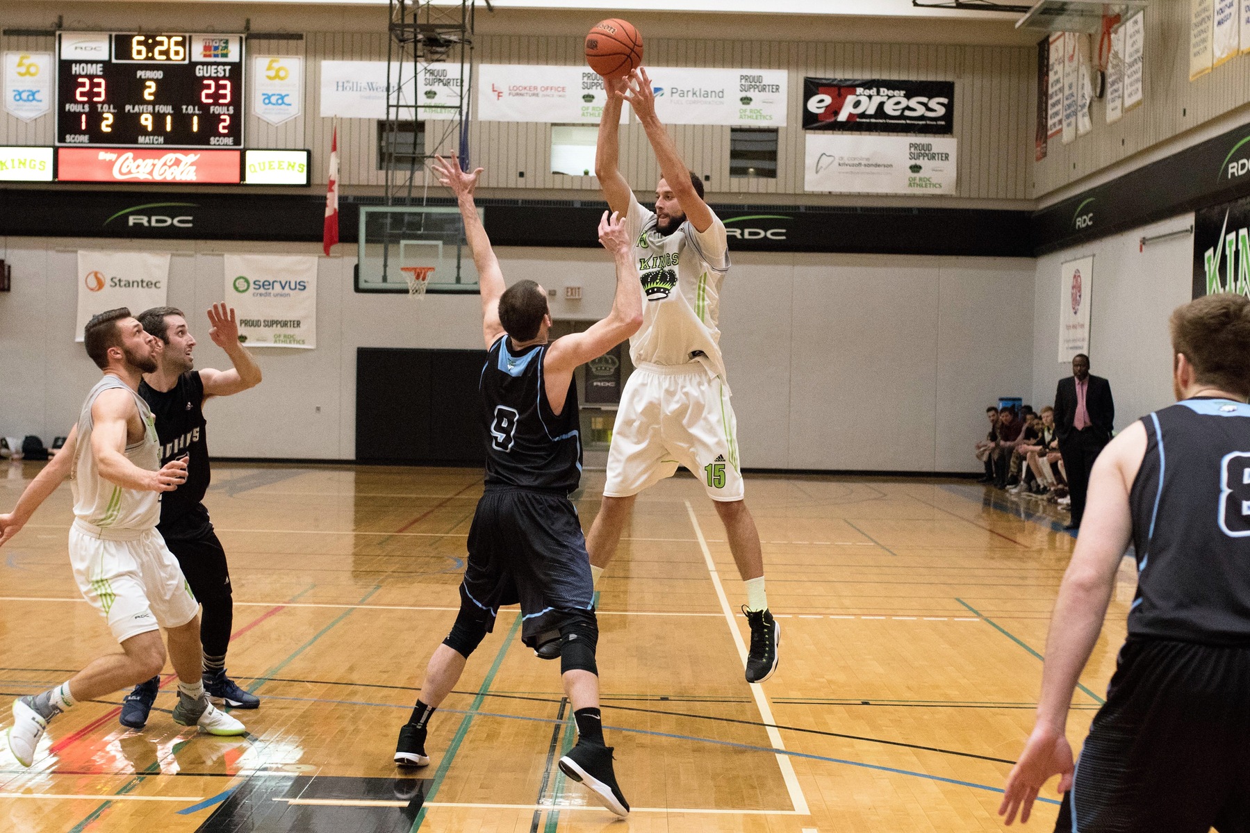 Shayne Stumpf (15) finished with 10 points, 1 steal, 2 assists and 8 rebounds in an exciting game. Matt Matear (12) contributed 17 points, 2 steals, 2 assists and 8 rebounds.
Photo - Tony Hansen